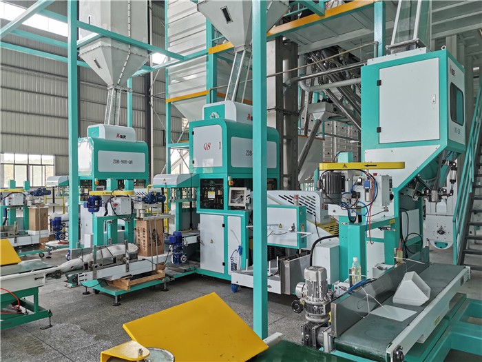 flour packing line with auger feeding open-mouth bag filling and sewing