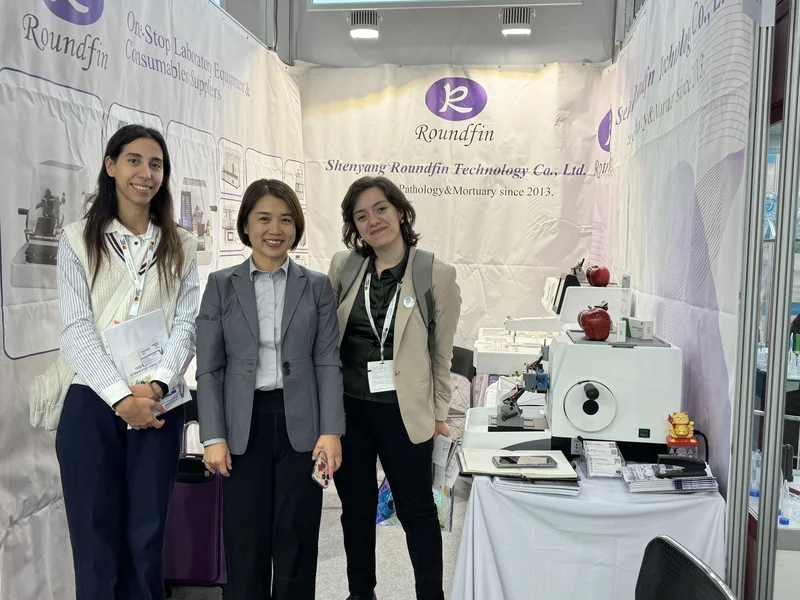 Roundfin exhibition booth at MEDICA 2025 Düsseldorf featuring histopathology equipment