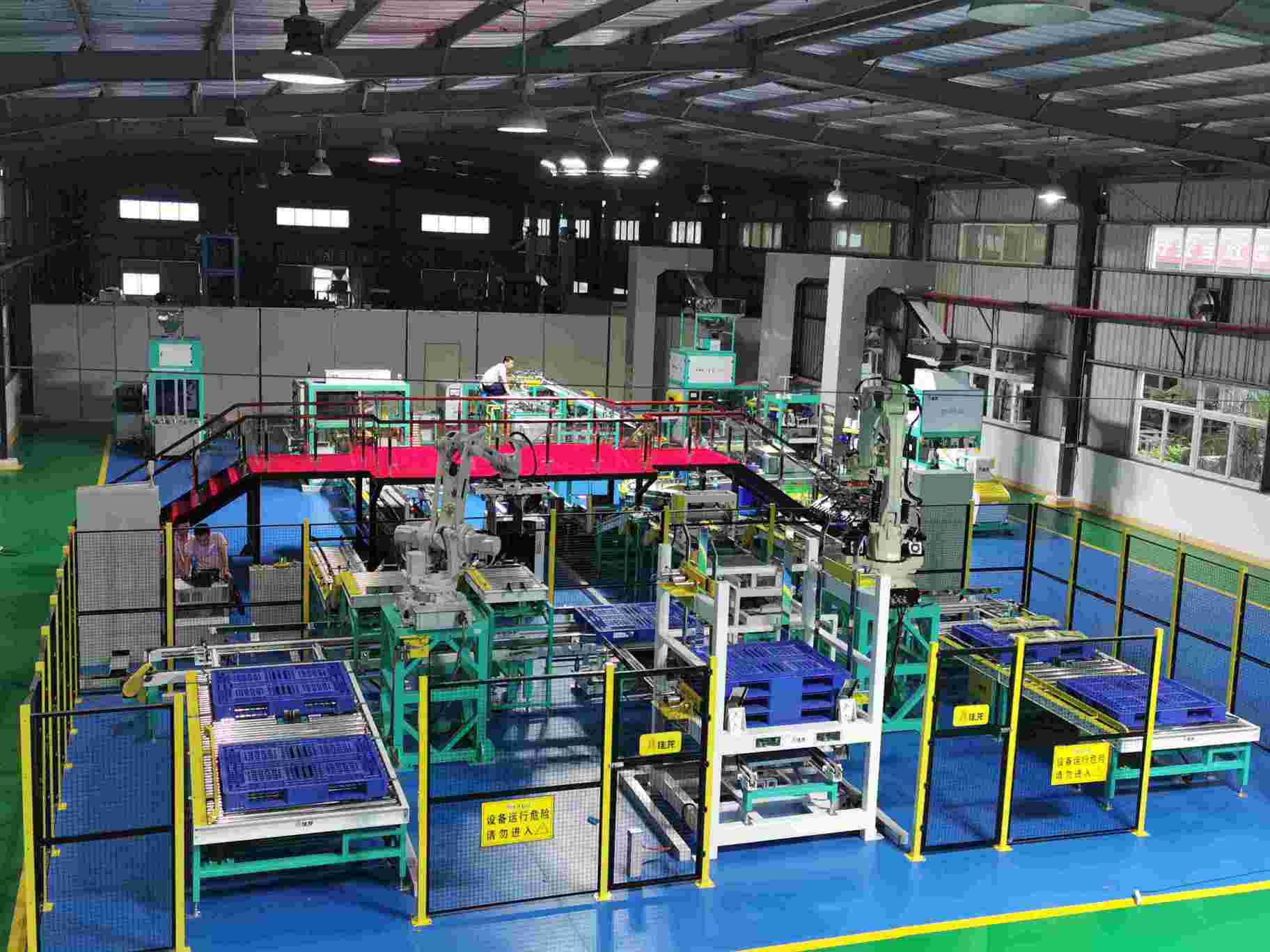 Zhangzhou Jialong Technology exhibition hall with robotic palletizing line and vacuum packaging machines