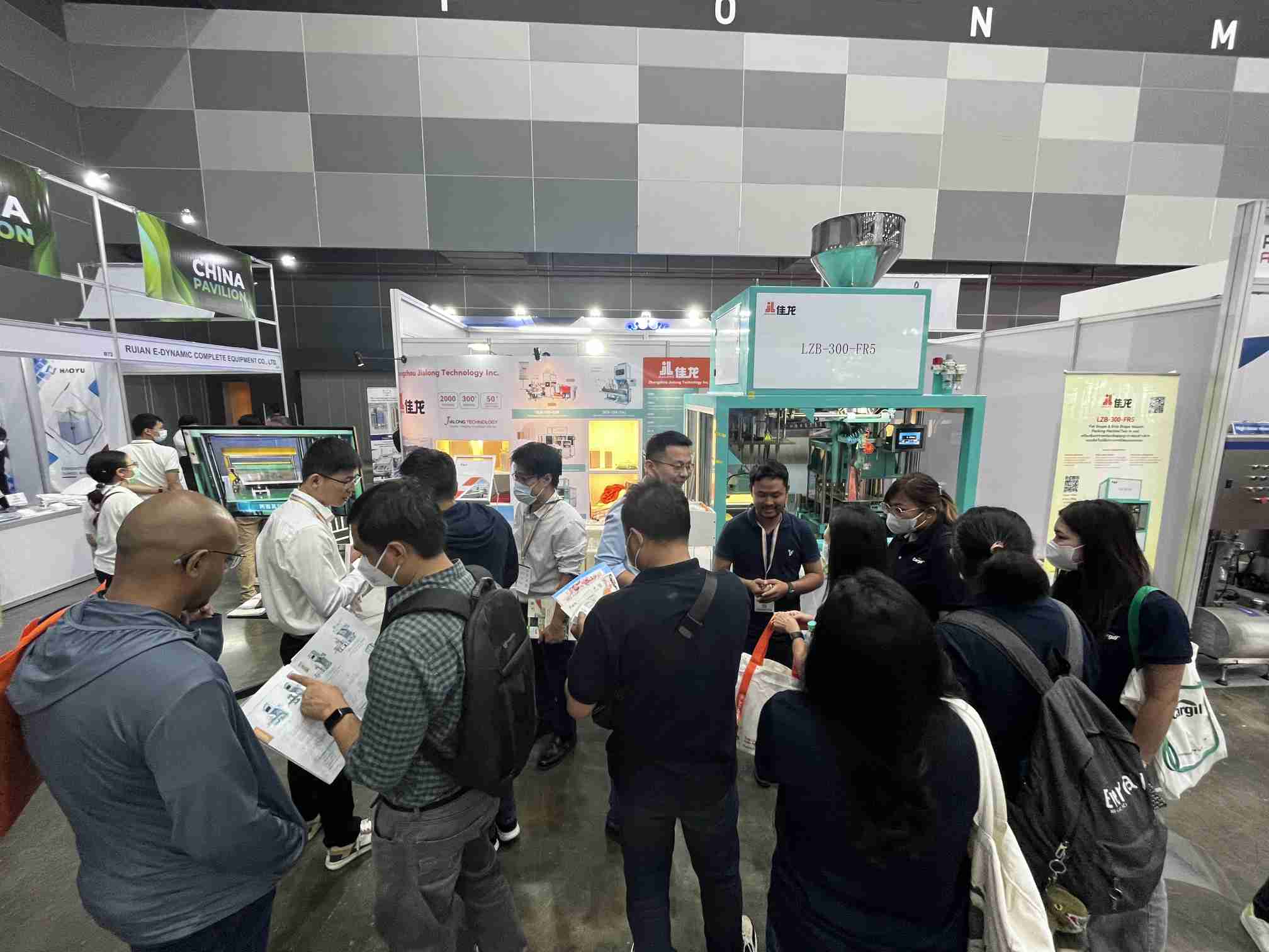 Zhangzhou Jialong’s booth at ProPak Thailand 2023 displaying automatic feed packaging machinery