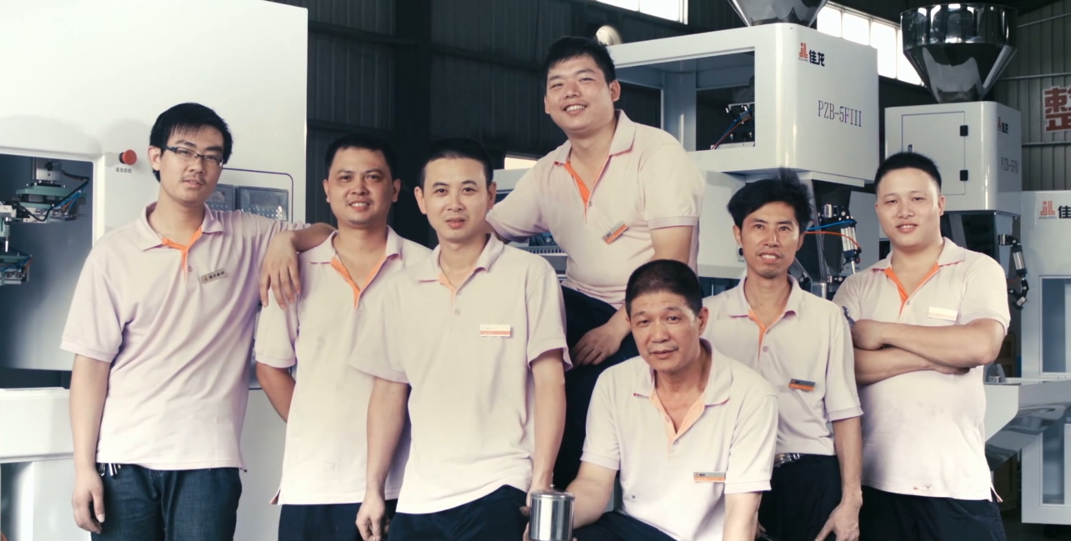 Zhangzhou Jialong Quality Control Center team testing vacuum packaging machine performance